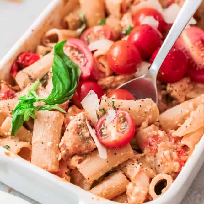 baked feta pasta with chicken in baking dish