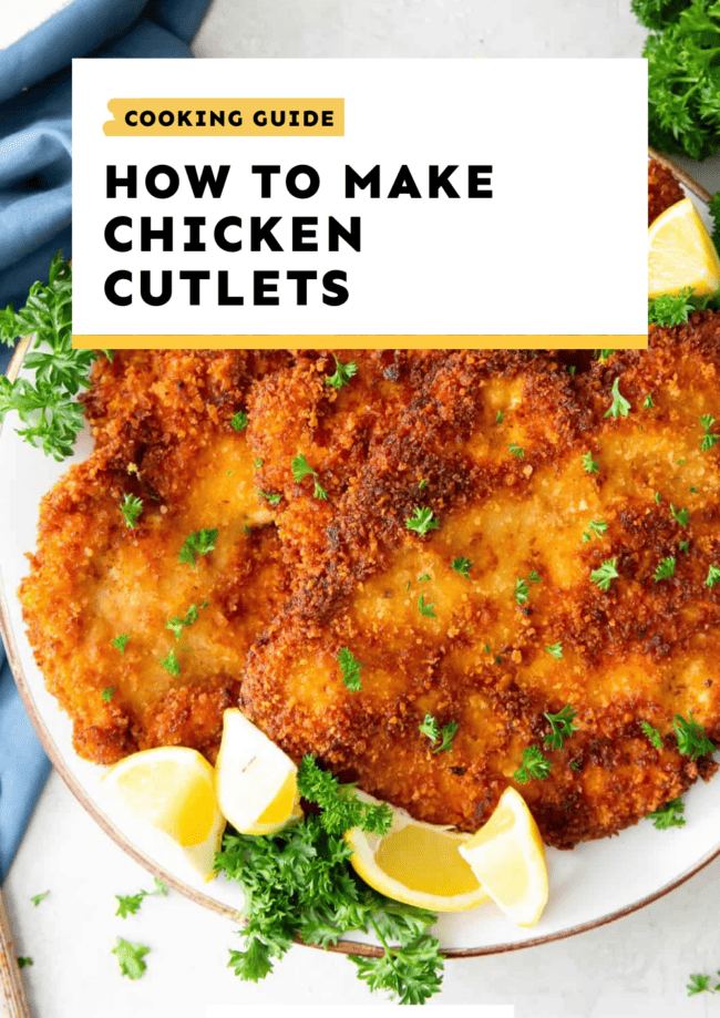 Making chicken cutlets with lemons on a plate.